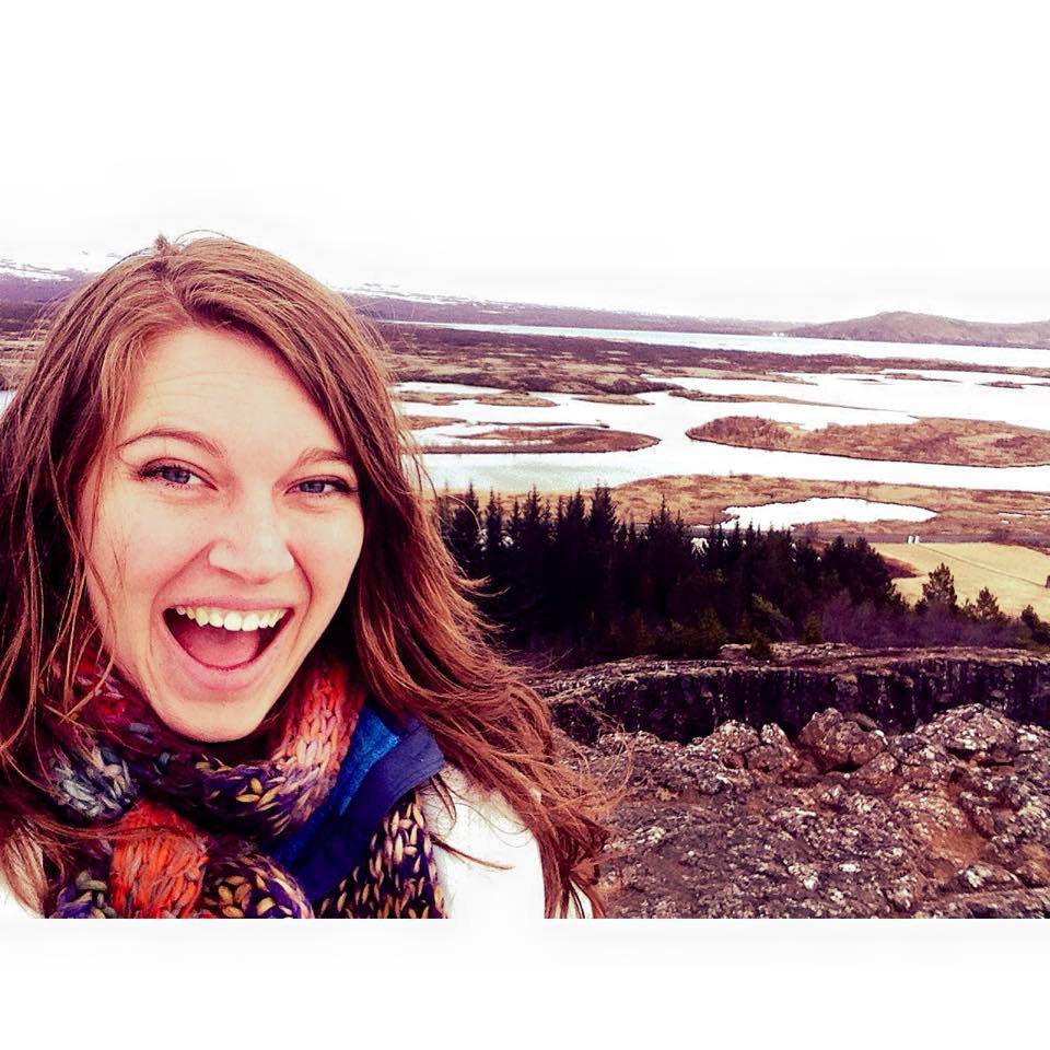 Bethany Dooley smiling outdoors in front of an Icelandic landscape